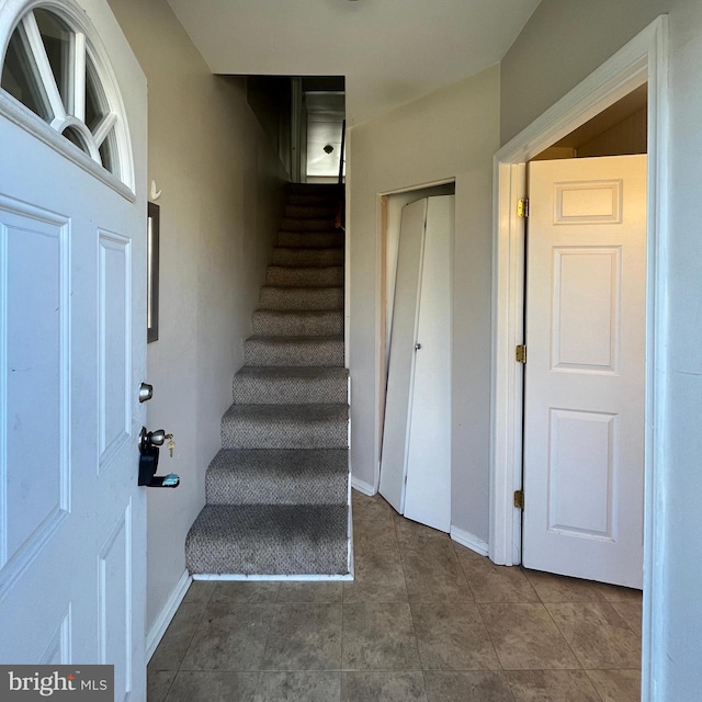 stairway with baseboards