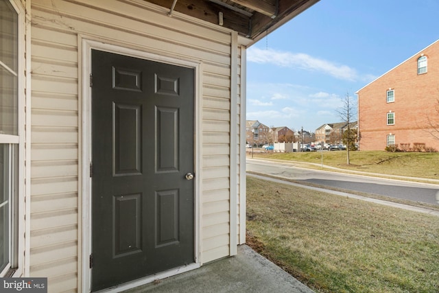 doorway to property with a residential view