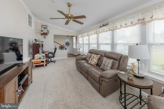 living room with baseboards, carpet flooring, crown molding, lofted ceiling, and ceiling fan