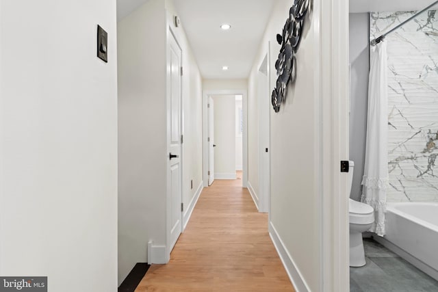 hall featuring recessed lighting and light wood-type flooring