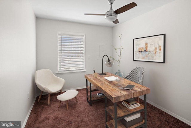 carpeted home office featuring ceiling fan and baseboards