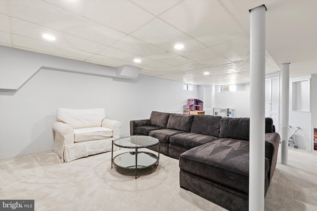 carpeted living room featuring recessed lighting and a paneled ceiling