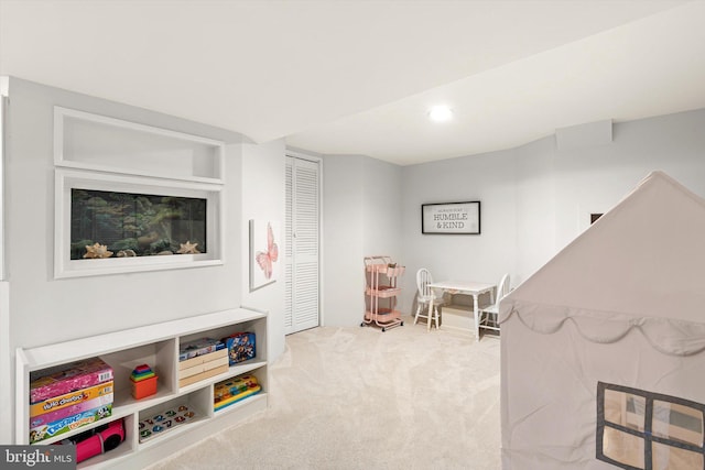 recreation room featuring carpet flooring and recessed lighting