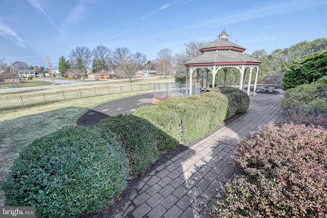 view of yard featuring a gazebo and fence