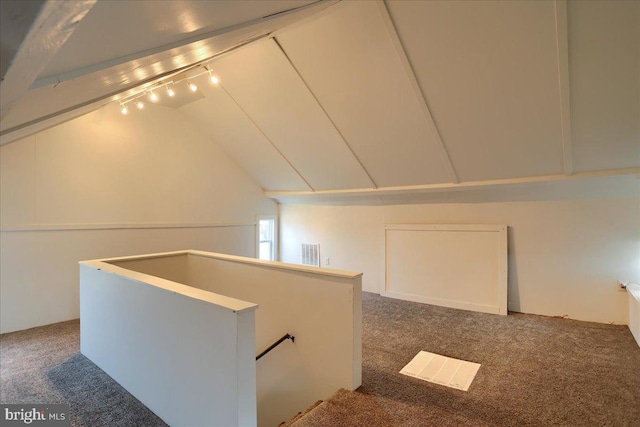 bonus room with visible vents, carpet, and lofted ceiling