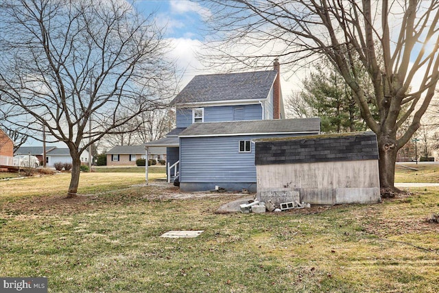 exterior space featuring a lawn, a chimney, and roof with shingles