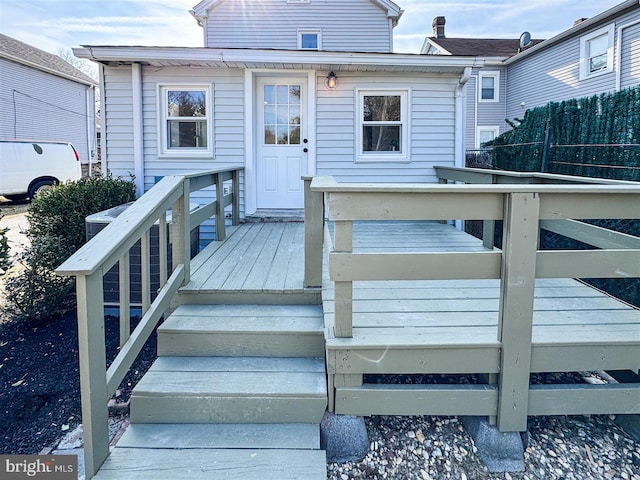 exterior space featuring a wooden deck