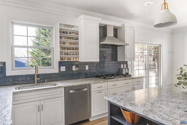 kitchen featuring open shelves, a sink, appliances with stainless steel finishes, crown molding, and wall chimney range hood