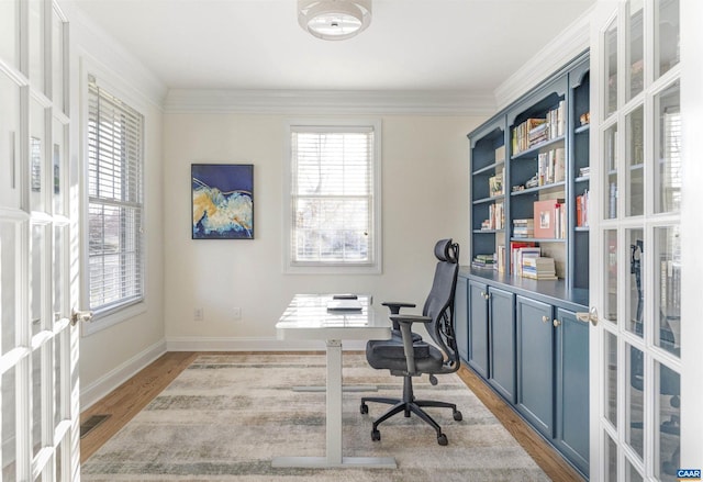 office area with french doors, visible vents, wood finished floors, and ornamental molding