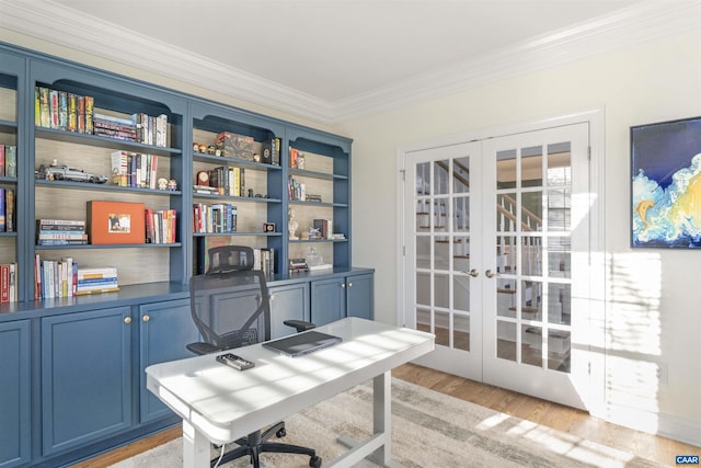 office space featuring light wood finished floors, french doors, and crown molding