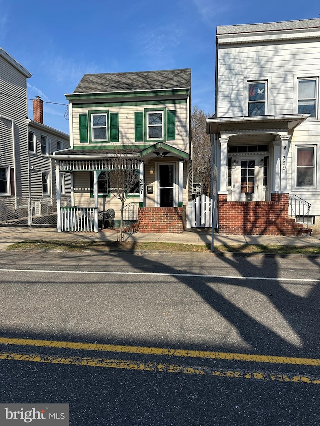 view of front of property featuring brick siding