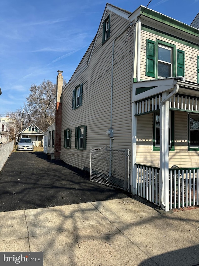 view of home's exterior with driveway