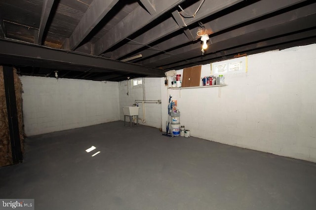 basement featuring a sink