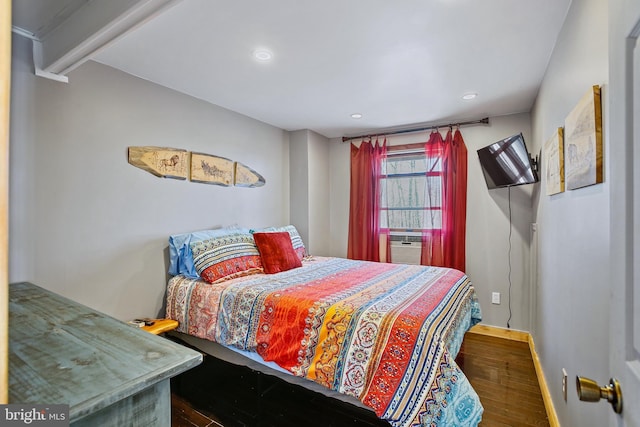 bedroom featuring recessed lighting, wood finished floors, and baseboards