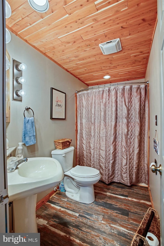 full bathroom with visible vents, wooden ceiling, toilet, and wood finished floors