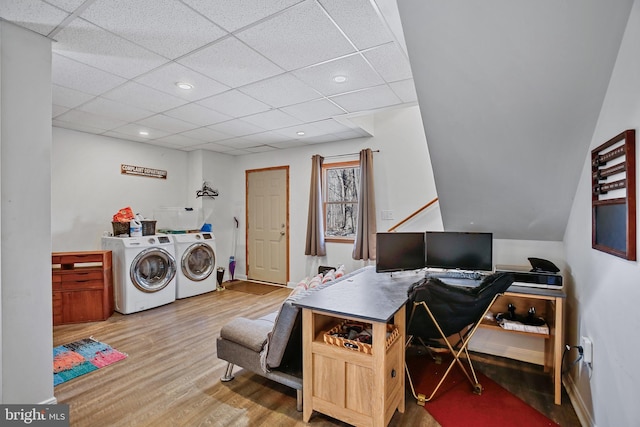 laundry room with washer and clothes dryer, laundry area, recessed lighting, and wood finished floors