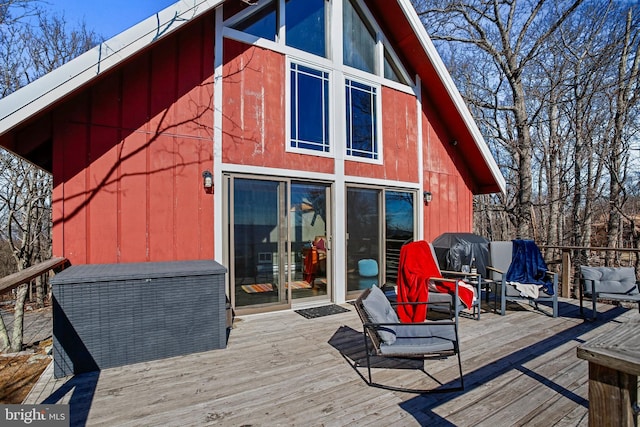 wooden deck featuring area for grilling