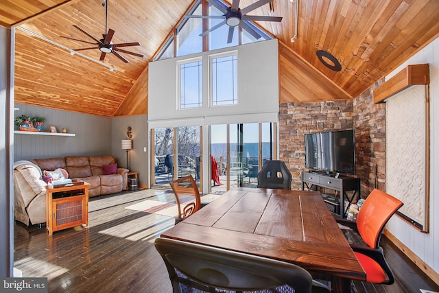 dining room featuring wooden ceiling, a ceiling fan, and wood-type flooring