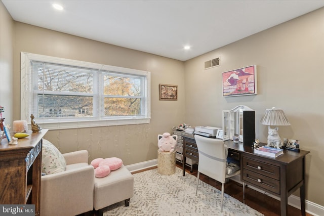 office featuring recessed lighting, wood finished floors, visible vents, and baseboards