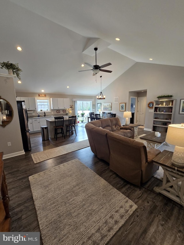 living area with vaulted ceiling, recessed lighting, and dark wood-style floors