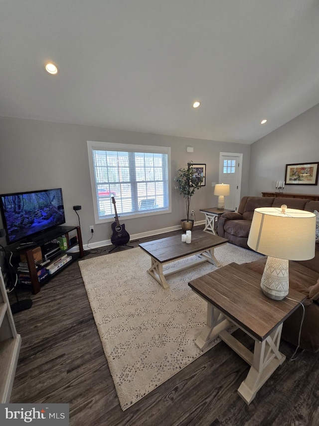 living area featuring recessed lighting, baseboards, lofted ceiling, and dark wood finished floors