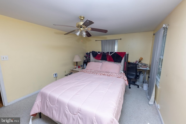 bedroom featuring baseboards, carpet, and ceiling fan