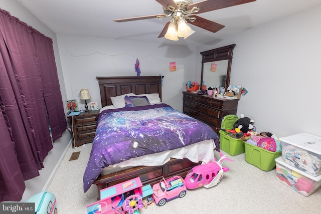 carpeted bedroom with a ceiling fan