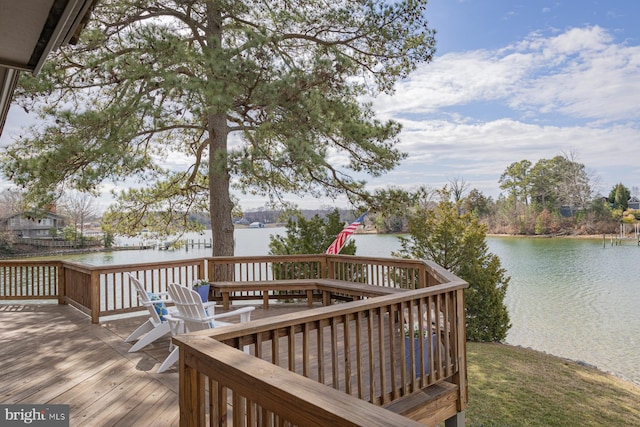 deck featuring a water view