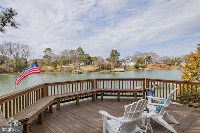 wooden terrace with a water view