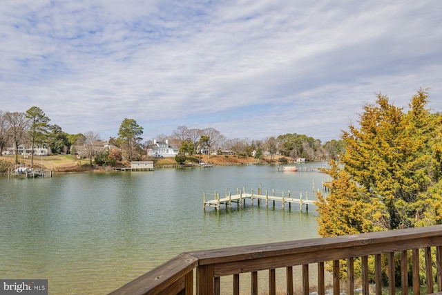 view of water feature with a dock