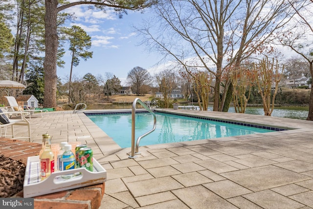 pool with a patio area