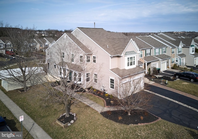 birds eye view of property featuring a residential view