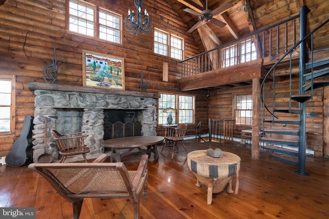 64 Harlingen Rd, Belle Mead, NJ 08502 - living room with log walls, wood ceiling, high vaulted ceiling, and hardwood / wood-style flooring