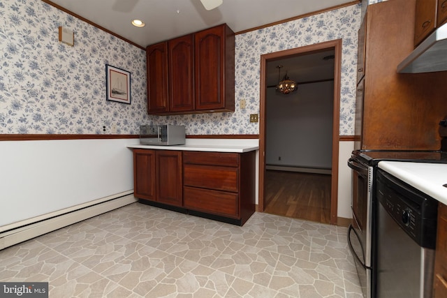 kitchen featuring stone finish floor, under cabinet range hood, stainless steel appliances, wallpapered walls, and baseboard heating