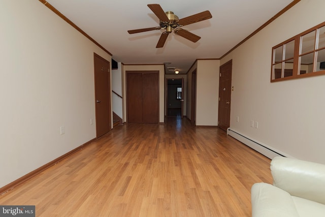 unfurnished living room featuring light wood finished floors, crown molding, ceiling fan, baseboards, and baseboard heating