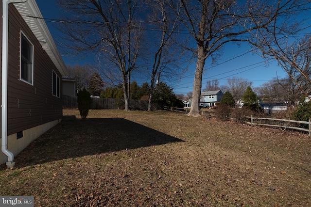 view of yard with fence