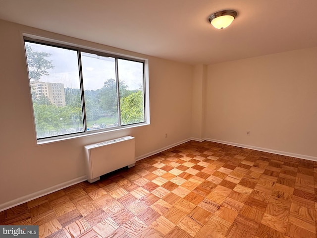 6621 Wakefield Dr Unit 403, Alexandria, VA 22307 - unfurnished room featuring radiator heating unit and baseboards