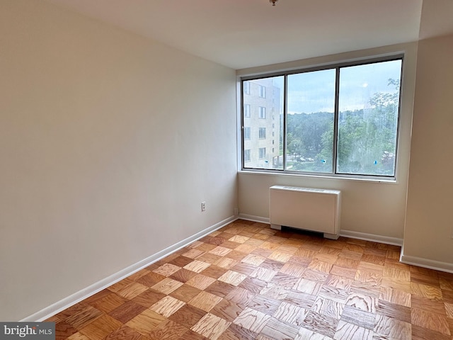 6621 Wakefield Dr Unit 403, Alexandria, VA 22307 - empty room with radiator heating unit and baseboards