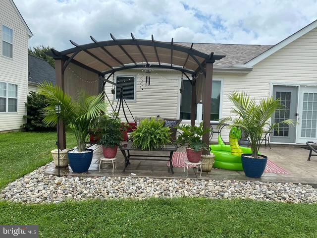 view of patio / terrace featuring a pergola