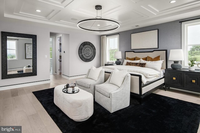 bedroom with recessed lighting, visible vents, coffered ceiling, and wood finished floors