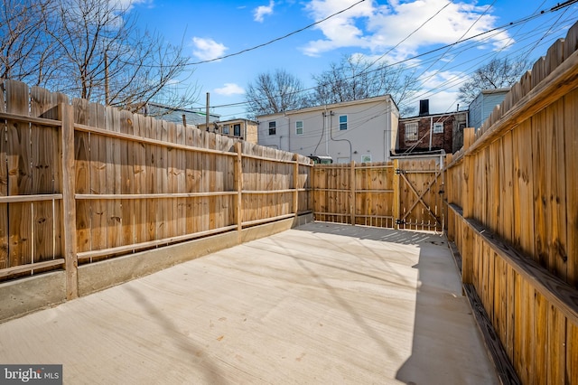 view of patio featuring a gate and a fenced backyard