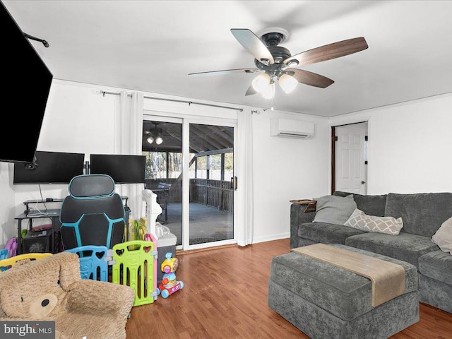 living area featuring a wall mounted AC, ceiling fan, and wood finished floors