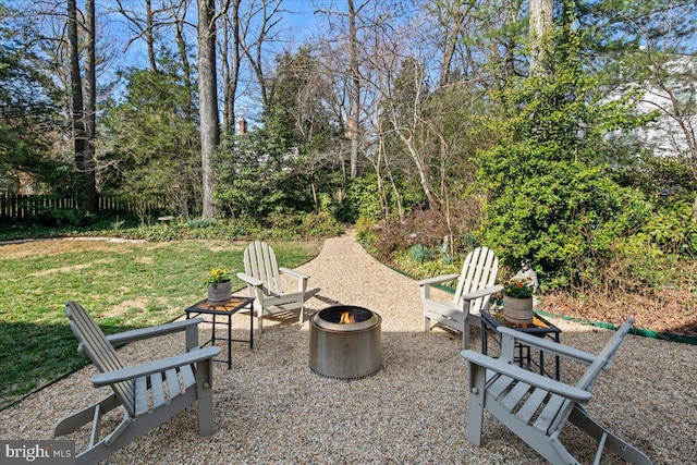 view of yard with a patio area and an outdoor fire pit