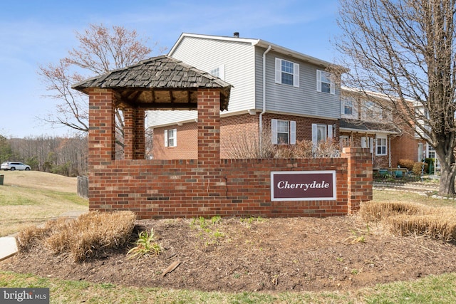 view of community sign