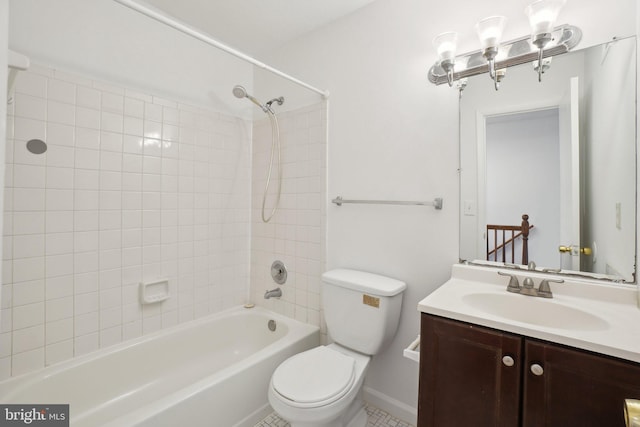 bathroom with vanity,  shower combination, and toilet