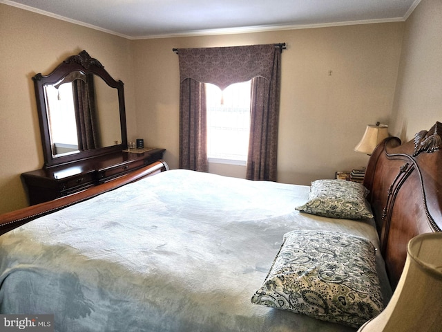 bedroom featuring crown molding