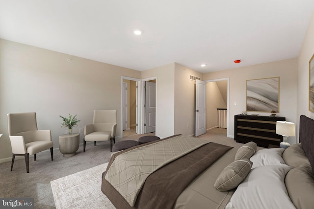 bedroom featuring light carpet, visible vents, recessed lighting, and baseboards