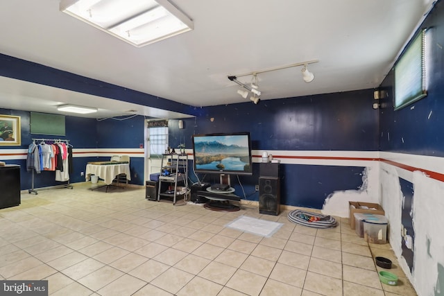 interior space featuring wainscoting and tile patterned flooring