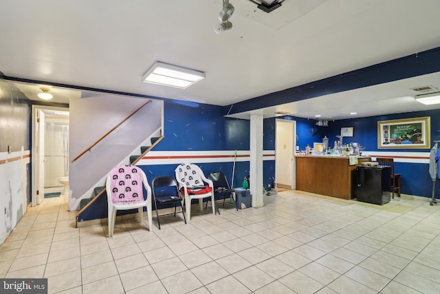 interior space with visible vents and stairway