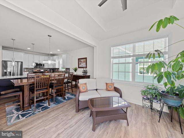 living room with recessed lighting, baseboards, light wood-type flooring, and a ceiling fan